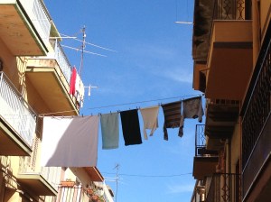 The village's main street is the widest, so it's the best place to hang laundry.